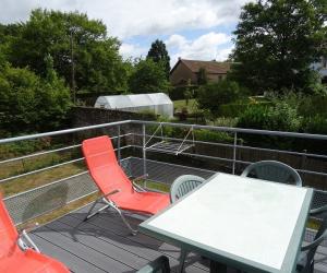 Photo Beau T1 avec une terrasse à 300 mètres des thermes de Bains les Bains, au 1er étage - PANO 45 - 