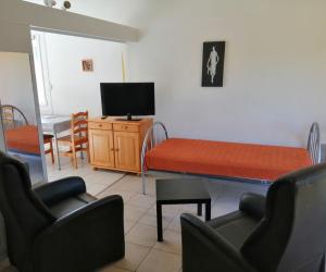 Photo Grand studio avec terrasse, à Bains-les-Bains - N°7 -