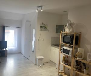 Photo studio 2 personnes au 2 etage d'une résidence calme à 100 m de la cure de Néris