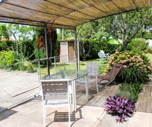 Photo Rochefort : 2 pièces de plain pied avec parking et terrasse + accès jardin - Echa