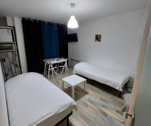 Photo Appartement situé plein sud avec balcon et 2 lits simples à Bagnoles-de-l’Orne